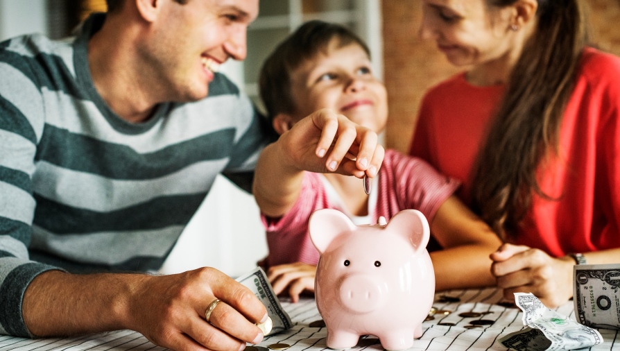 family with piggy bank