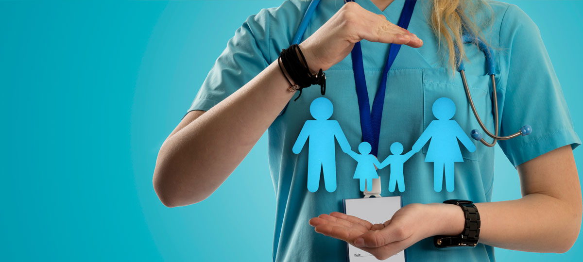 doctor holding paper family cutout